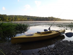 Fishing kayak on lake